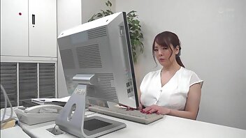 Japanese babe Hitomi Tanaka's huge titties and slutty office attire will make your dick throb with desire!